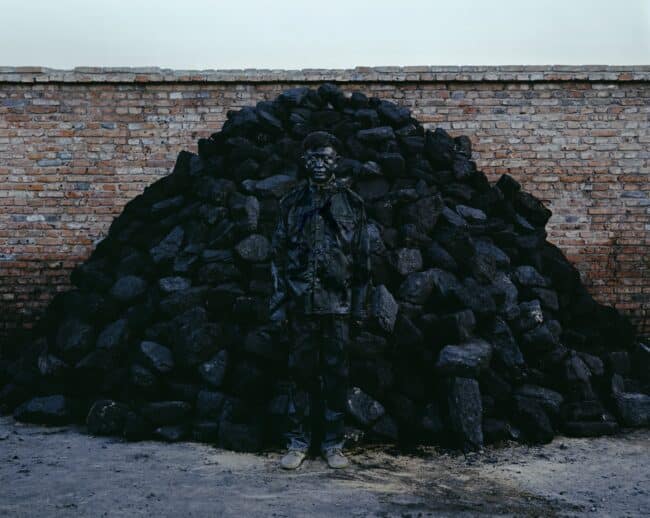 Hiding in the City, No. 95, Coal Pile by Liu Bolin