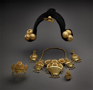 Jewelry ensemble in Harn collection by Oumou Sy and Bobo and his brothers (goldsmiths
