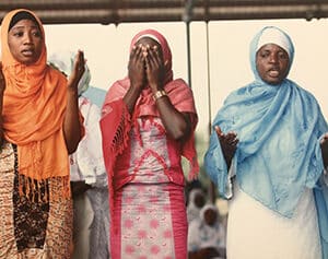 Prayer (Three NASFAT female members praying together) by Akintunde Akinleye