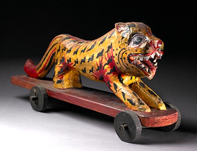 Toy Tiger on Wheels