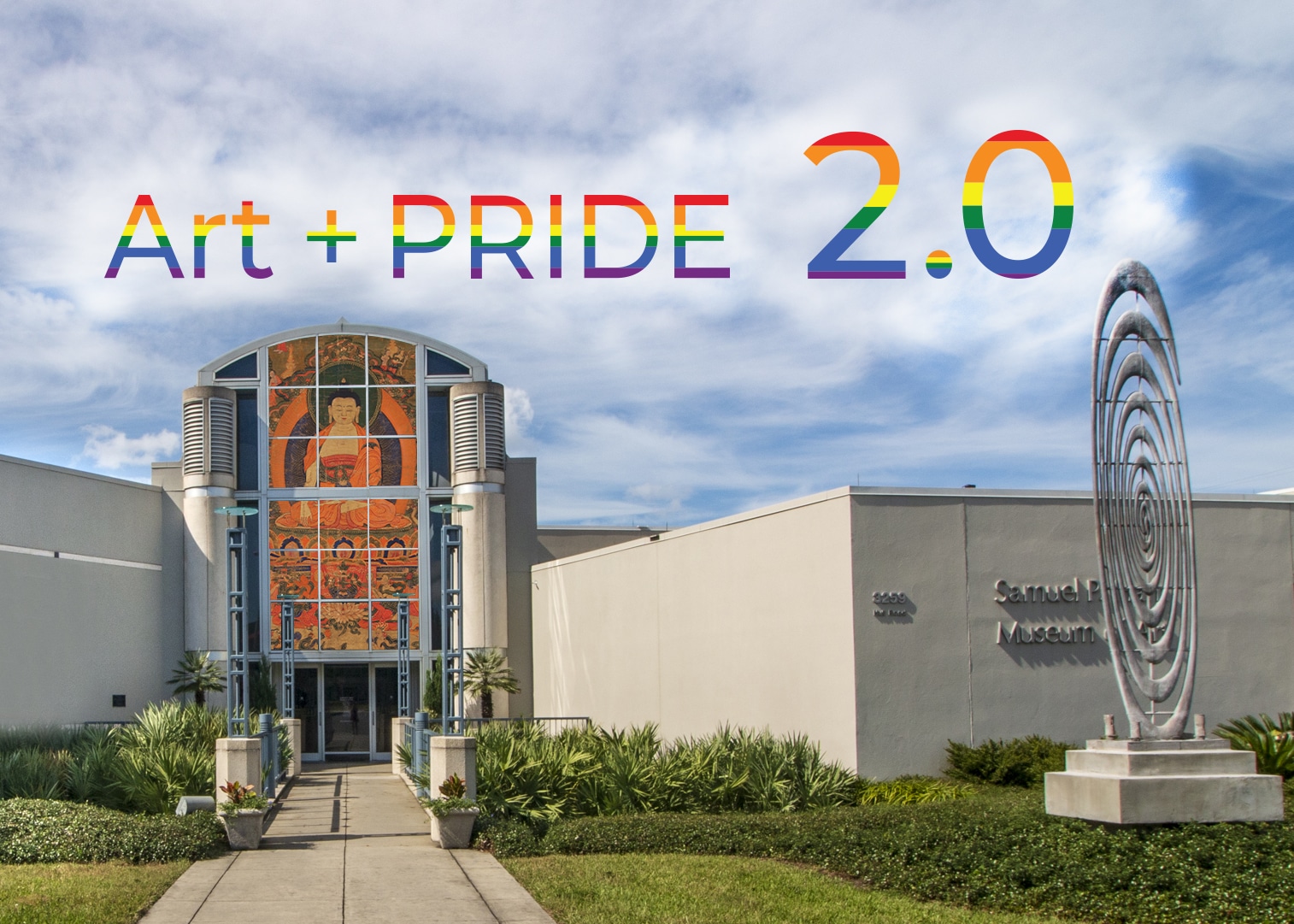 photo of the Harn Museum with a rainbow flag "Art + PRIDE 2.0" over the building