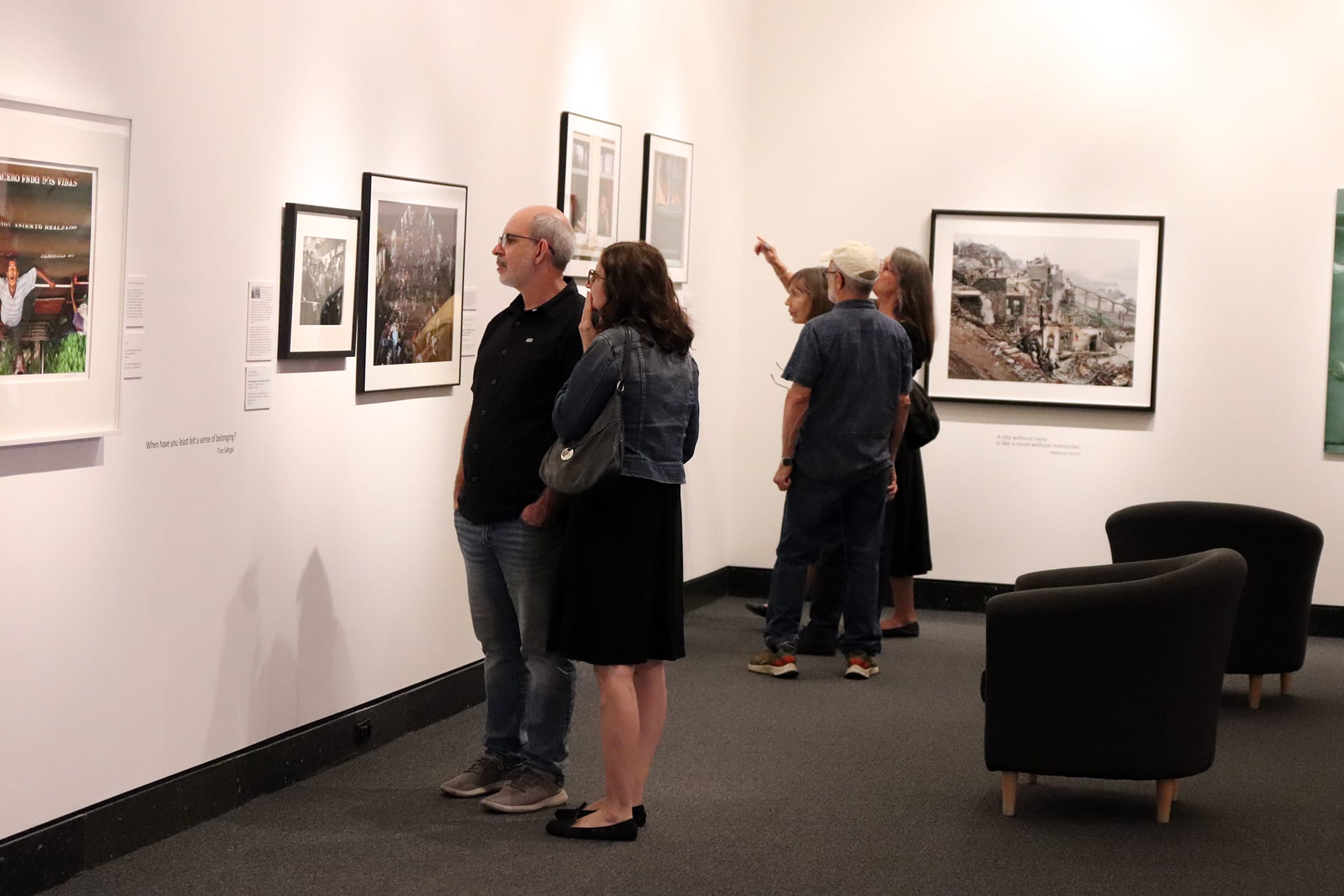 visitors in the gallery looking at art