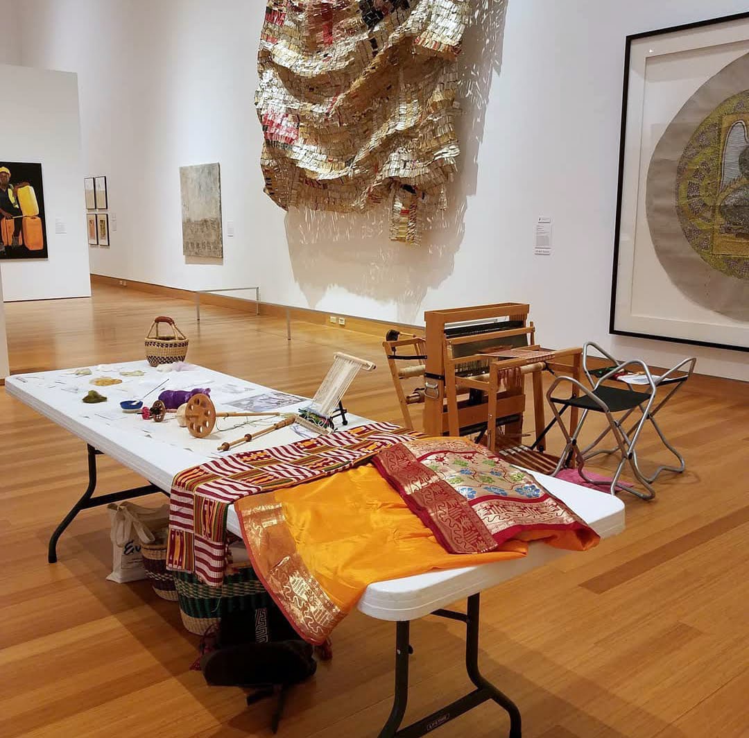 Table and equipment set up in the contemporary gallery for the Fiber Arts Gathering workshop