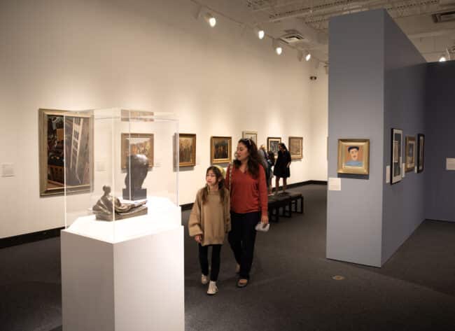 Visitors looking at art in the Modern gallery